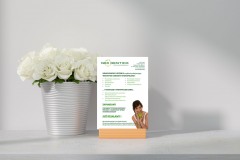 Mockup white greeting card standing on table