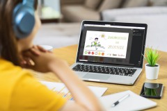 Back side of Asian business woman using laptop with white screen for creative and design in modern of house, working from home and stay at home when covid-19 outbreak,blank screen mockup copy space